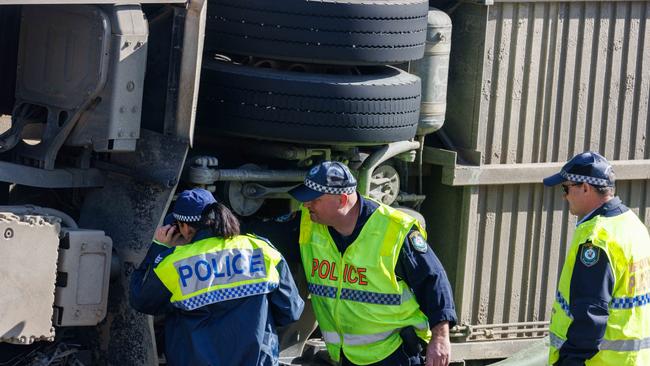 Police comb the crime scene after the crash. Picture: NCA NewsWire / David Swift