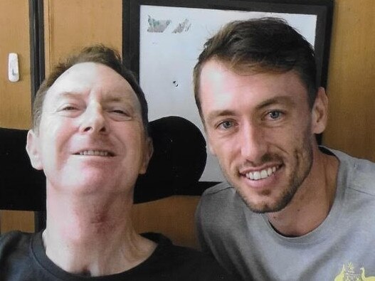 Tennis player John Millman (right) with the late Paul Malone Picture Supplied