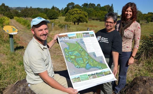 Showing off plans for a constructed wetland at Slaters Creek in North Lismore are (l-r) Lismore City Council’s environmental strategies coordinator, Nick Stephens, Aunty Thelma James and the council’s catchment management officer, Vanessa Tallon.High resolution image available on request.