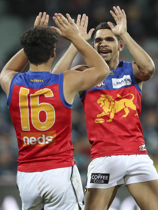 Charlie Cameron celebrates a goal with Cam Rayner.