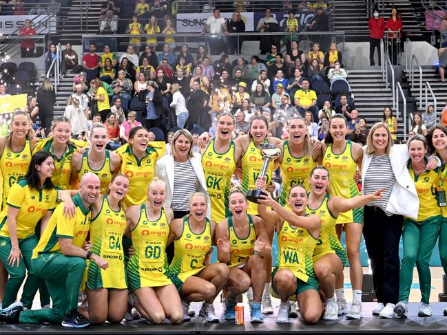 GOLD COAST, AUSTRALIA - OCTOBER 23: Liz Watson of Australia holds up the Constellation Cup as the Australian team celebrates victory after the Constellation Cup match between the Australia Diamonds and New Zealand Silver Ferns at Gold Coast Convention and Exhibition Centre on October 23, 2022 in Gold Coast, Australia. (Photo by Bradley Kanaris/Getty Images) *** BESTPIX ***