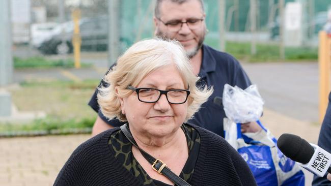 Rosemary Maione leaves the Adelaide Women’s Prison with her son after being released on bail. Picture: Brenton Edwards