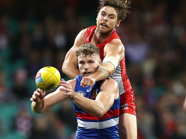 Sydney defender Dane Rampe spoils Jake Stringer. Picture: Getty Images