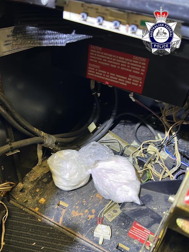 Police seized guns and ammunition hidden inside pokie machines on Wednesday. Picture: AFP
