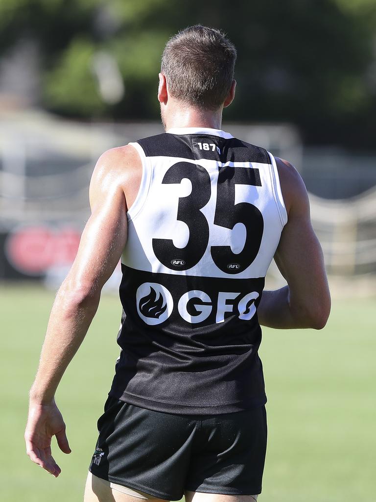 Brad Ebert wears the No. 35 guernsey at Alberton Oval. The jumper is a tribute and reminder of former teammate John McCarthy who died nearly seven years ago and is rotated amongst players every week. Picture Sarah Reed