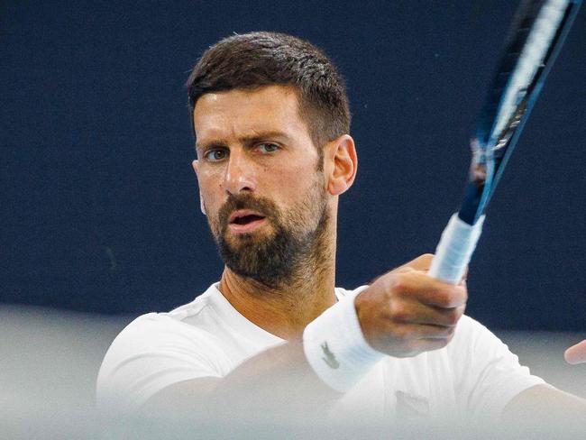 Serbian Novak Djokovic attends a training session before the Brisbane International tennis tournament in Brisbane on December 28, 2024. (Photo by Patrick HAMILTON / AFP) / -- IMAGE RESTRICTED TO EDITORIAL USE - STRICTLY NO COMMERCIAL USE --