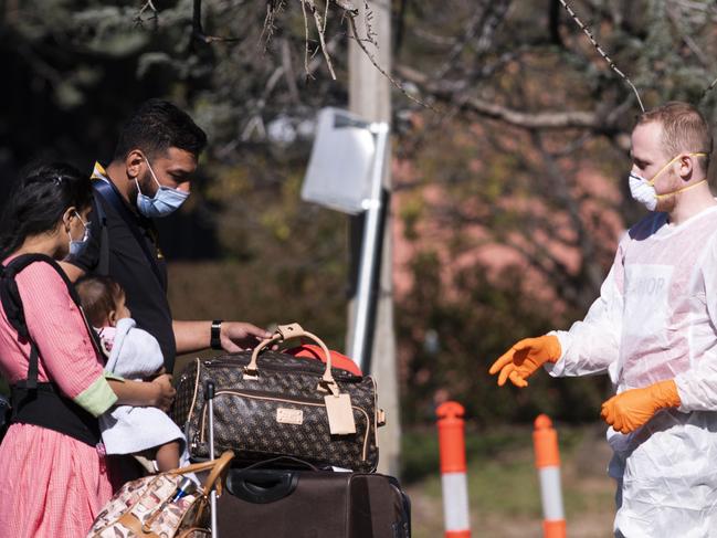 Passengers arrive at hotel quarantine in Canberra after disembarking from a repatriation flight from India. Picture: Rohan Thomson/Getty Images