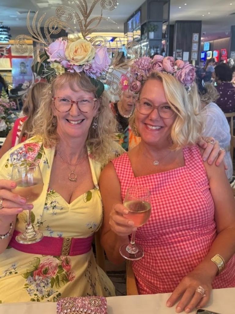 Cris Reed and Meaghan Kotzur celebrating the Melbourne Cup at Gympie RSL Club.