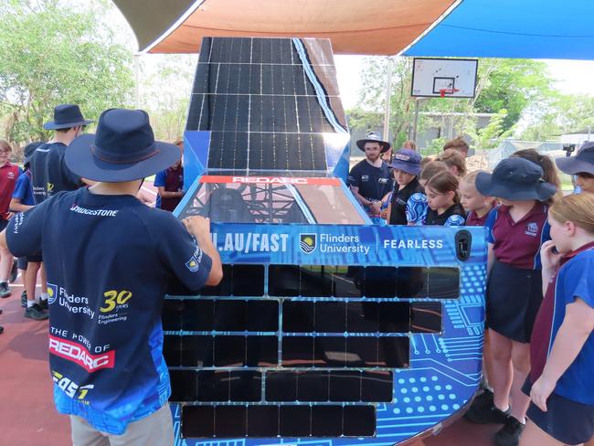 The Flinders University cruiser class solar electric car with the boot and bonnet lifted upwards towards the sun, Monday, October 16, 2023. Picture: Darcy Jennings.