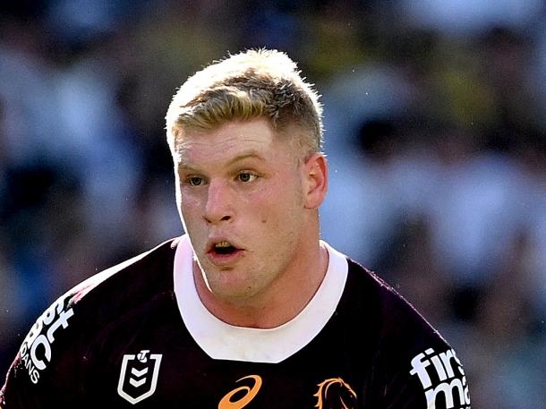 BRISBANE, AUSTRALIA - JUNE 25: Tom Flegler of the Broncos looks to take on the defence of Joe Stimson of the Titans during the round 17 NRL match between Brisbane Broncos and Gold Coast Titans at Suncorp Stadium on June 25, 2023 in Brisbane, Australia. (Photo by Bradley Kanaris/Getty Images)