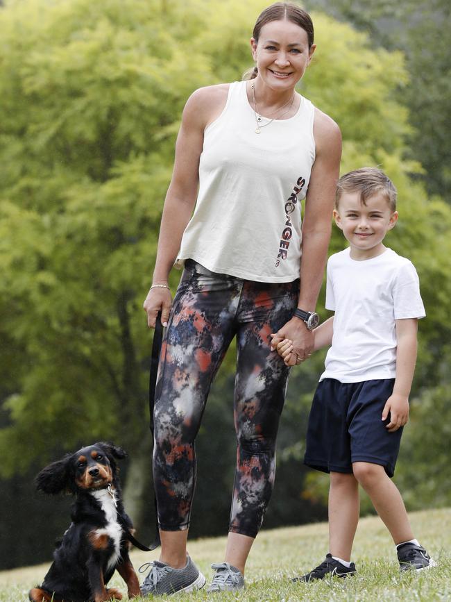 Michelle Bridges with son Axel and their dog Banjo. Picture: Jonathan Ng