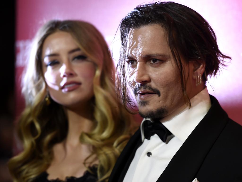 Amber Heard, left, and Johnny Depp arrive at the 27th annual Palm Springs International Film Festival Awards Gala on Saturday, Jan. 2, 2016, in Palm Springs, Calif. Picture: Jordan Strauss/Invision/AP