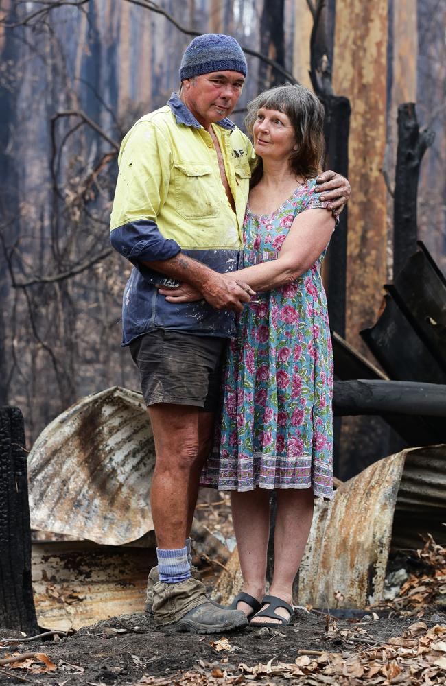 Parents Ash and Bridgette Buchanan in front of their old horse stables. Picture: Gaye Gerard