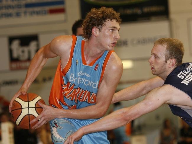 Queensland Basketball League grand final Marlins vs Rockhampton Rockets played at Aumuller St : No 10 Marlins James Comino, Rockets : Glenn Scott