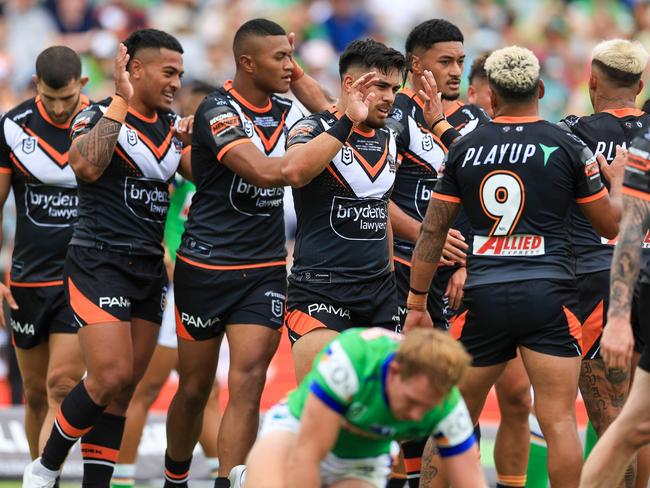 The Tigers celebrate the try of Samuela Fainu. Picture: Jenny Evans/Getty Images