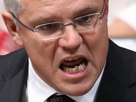 Scott Morrison, Minister for Immigration and Border Protection, responds during Question Time today in the House of Representatives, Federal Parliament, Canberra.