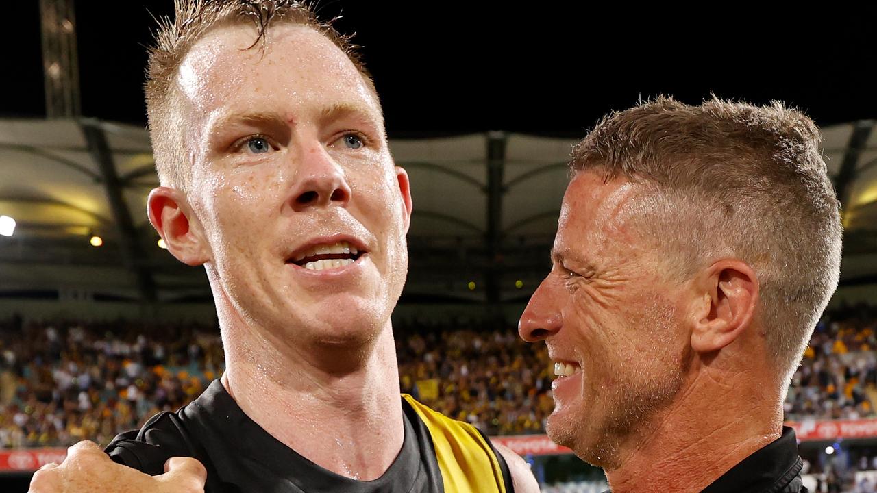 BRISBANE, AUSTRALIA - OCTOBER 24: Jack Riewoldt of the Tigers and Damien Hardwick, Senior Coach of the Tigers celebrate during the 2020 Toyota AFL Grand Final match between the Richmond Tigers and the Geelong Cats at The Gabba on October 24, 2020 in Brisbane, Australia. (Photo by Michael Willson/AFL Photos via Getty Images)