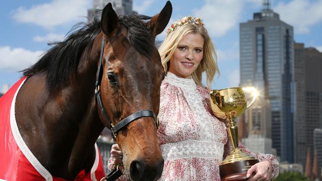 Dutch model Lara Stone with 1997 Melbourne Cup winner Might and Power . . Pic: Michael Klein