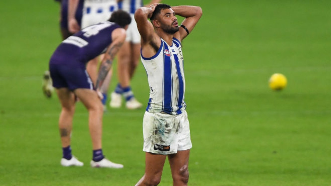 PERTH, AUSTRALIA - APRIL 24: Tarryn Thomas of the Kangaroos looks dejected after a loss during the 2021 AFL Round 06 match between the Fremantle Dockers and the North Melbourne Kangaroos at Optus Stadium on April 24, 2021 in Perth, Australia. (Photo by Daniel Carson/AFL Photos via Getty Images)