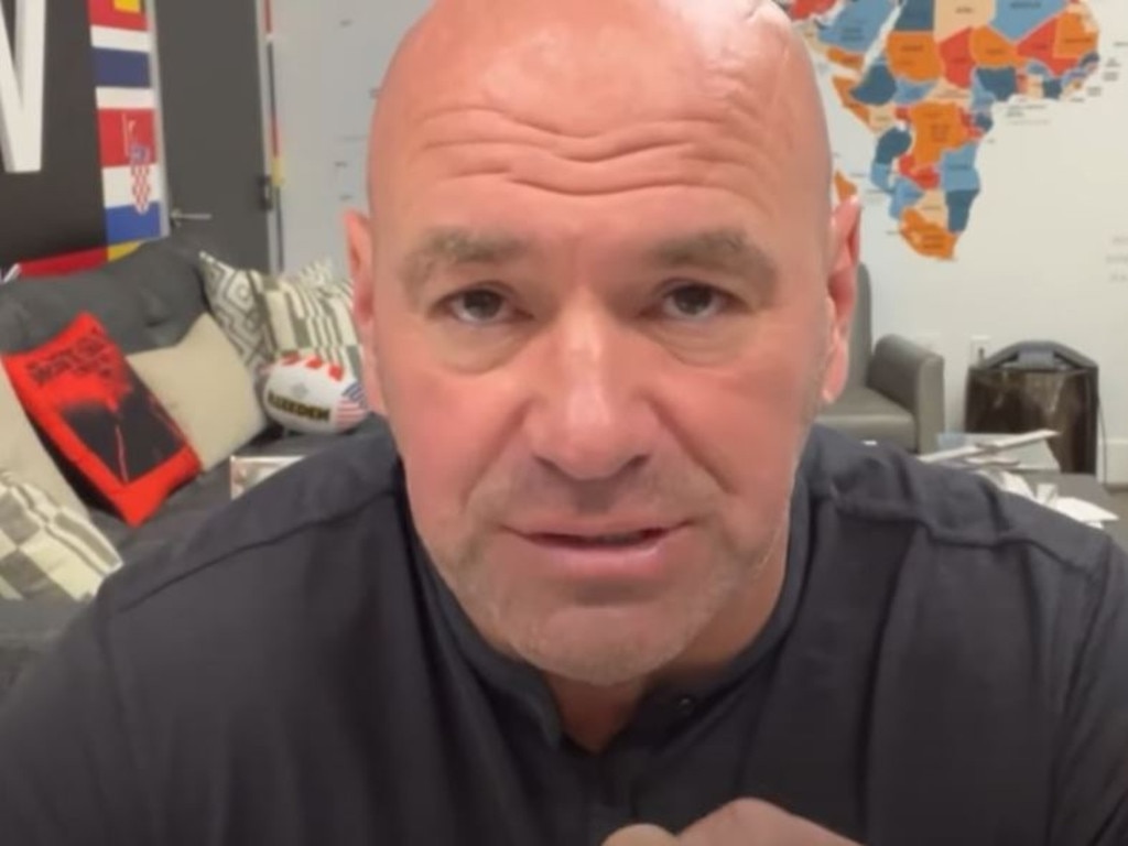 UFC boss Dana White with the NRL Steeden in the background.