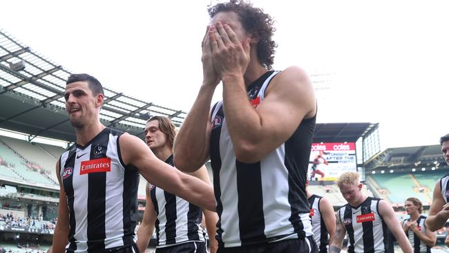 Scott Pendlebury and Chris Mayne come to terms with the loss to Gold Coast. Picture: Michael Klein