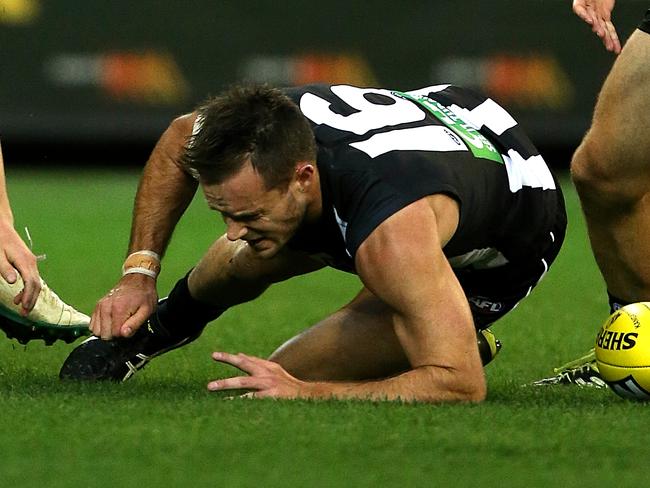 Collingwood fights off injury and strong West Coast team to record 8 ...