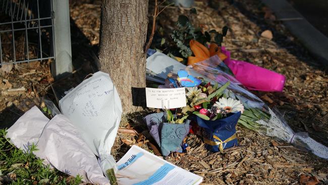 Flowers outside the Anglicare Newmarch House in Kingswood. Picture: Christian Gilles