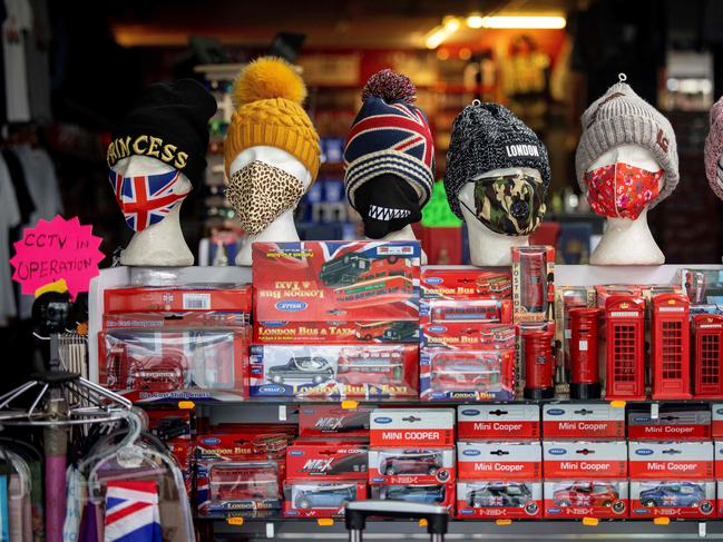 Face coverings are displayed for sale in the window of a souvenir shop in London. Picture: AFP