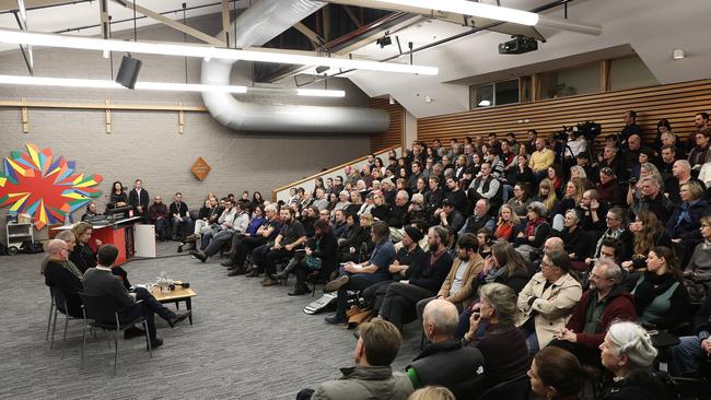 Audience listening to performance artist Mike Parr speaking about his latest work, Underneath The Bitumen. Picture: LUKE BOWDEN