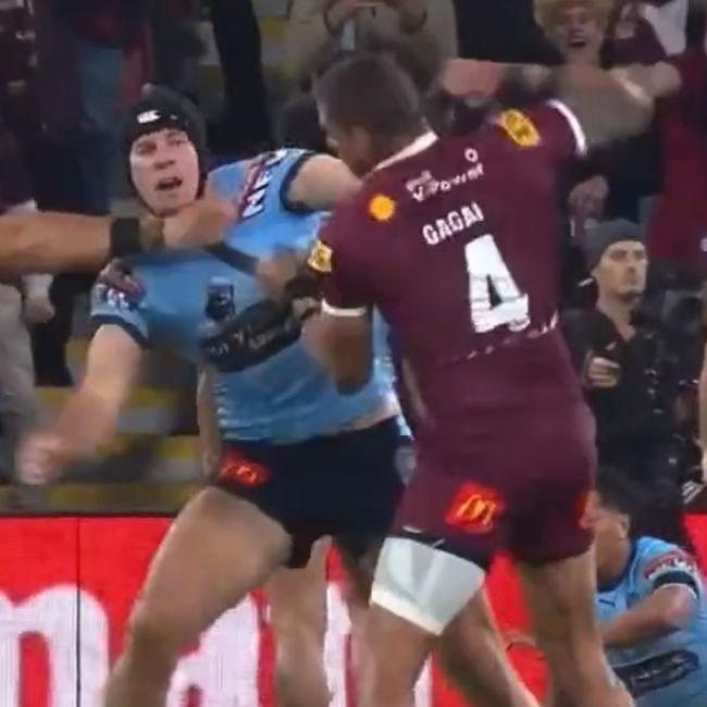 Dane Gagai and Matt Burton throw down during Origin 3 last year.