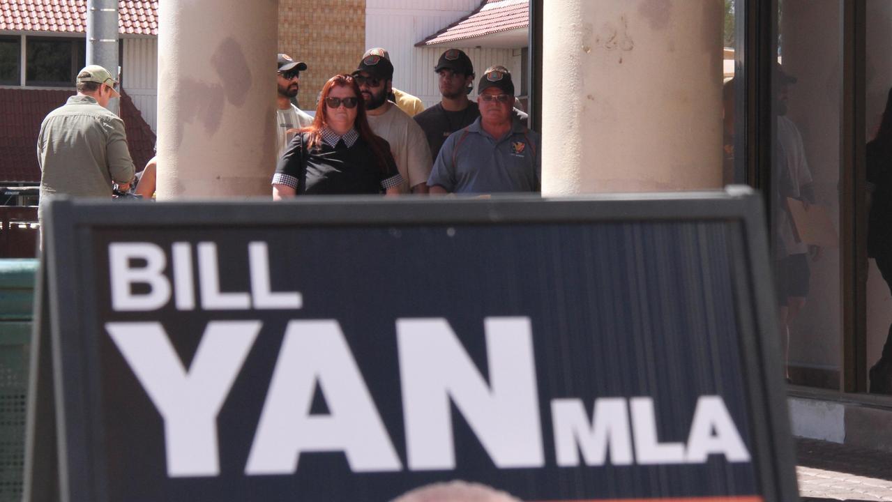 Unionised NT corrections officers descend on NT Treasurer Bill Yan’s office in Alice Springs. Picture: Gera Kazakov