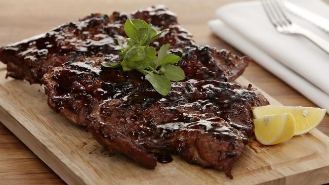 Pork ribs from Osso Steak and Ribs restaurant at the Panthers Leagues Club.