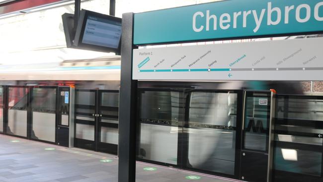 A Sydney Metro train pulls into Cherrybrook station.