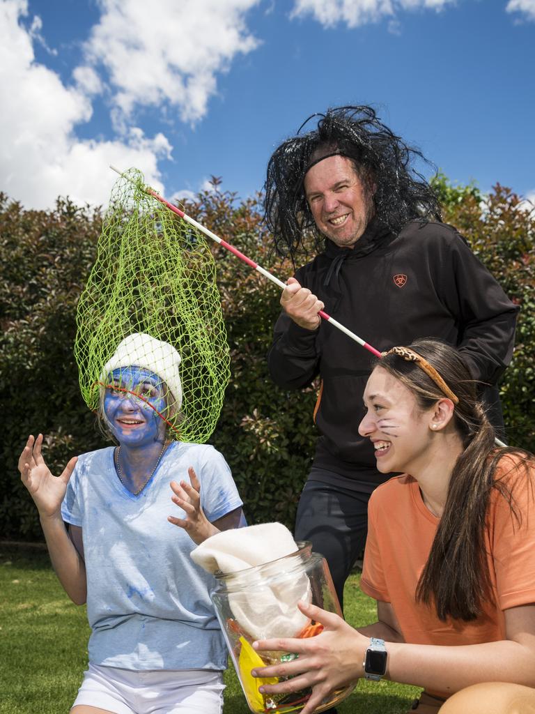 The CSW pastoral care group dressed up as characters from The Smurf's (from left) Jasmine Stewart, teacher Cameron Williams and Annie Seeto as St Ursula's College students dressed up for their boat race during St Ursula's Week, Wednesday, October 20, 2021. Picture: Kevin Farmer