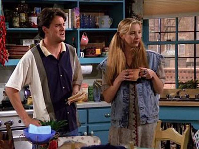 Perry - as Chandler Bing - alongside <i>Friends</i> co-star Lisa Kudrow (Phoebe Buffay).