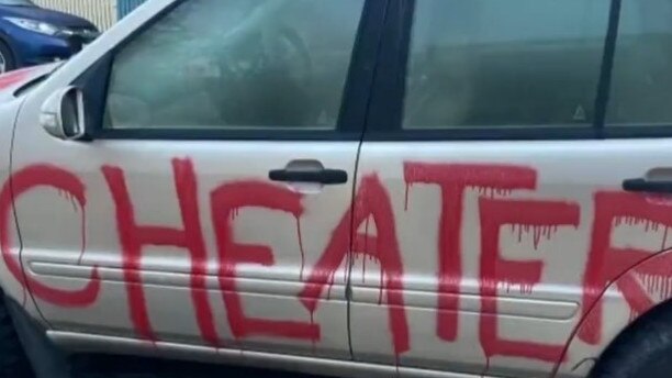 The word ‘cheater’ painted on the other side of the car. Picture: Sunrise