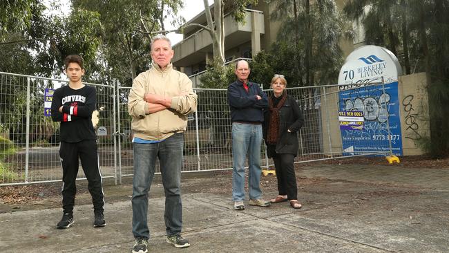 Alex and David Butten and Barry and Val Roache have had enough of squatters causing trouble at the old Berkeley Living site. Picture: Hamish Blair