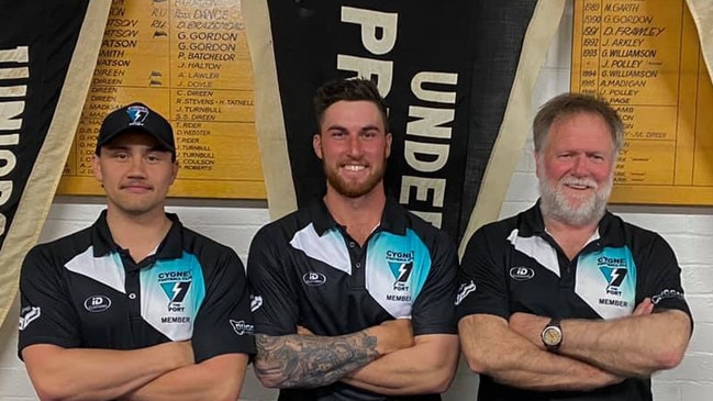 Ryan Wiggins (centre) pictured with playing coach Thor Boscott (left) and president David O’Neill in a signing announcement on Cygnet Football Club’s Facebook page.