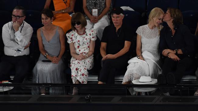 Qantas CEO Alan Joyce (left) Jayne Hrdlicka, editor Anna Wintour (third left), Australian film director Baz Luhrmann (third right), Australian actor Nicole Kidman and musician Keith Urban in the crowd at The Australian Open. Picture: AAP