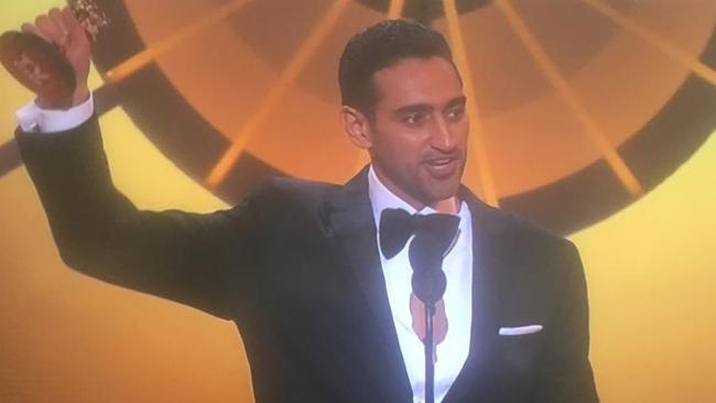 Golden moment: Waleed Aly savours his win.