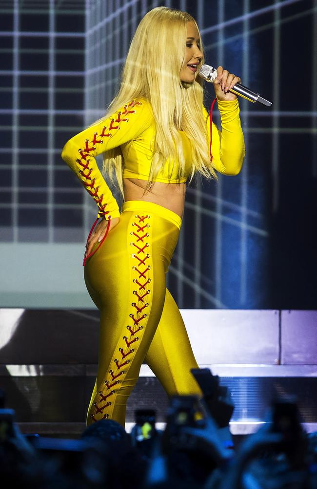 Iggy Azalea performed in a skin-tight yellow number with the strap theme continued. Picture: Chris Young/The Canadian Press via AP