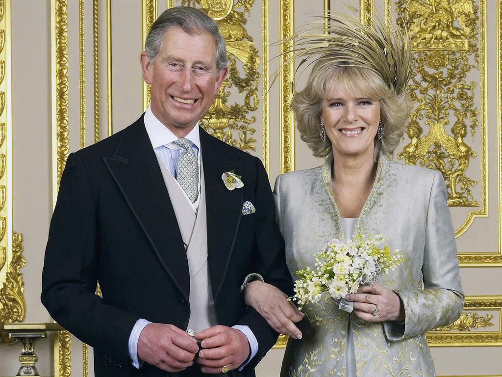 The then Prince of Wales and his new bride Camilla, Duchess of Cornwall in the White Drawing Room at Windsor Castle after their wedding ceremony in 2005. Picture: Getty Images