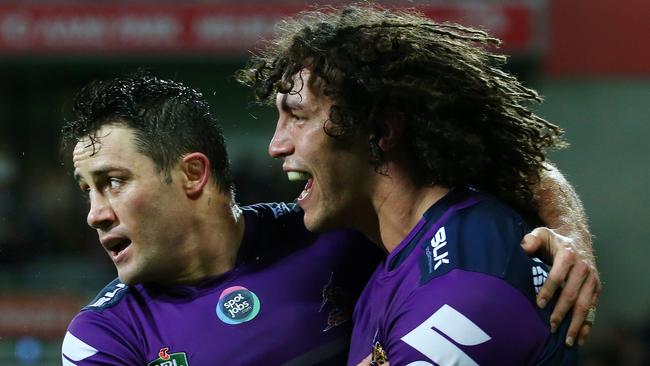 Cooper Cronk and Kevin Proctor celebrate a try.