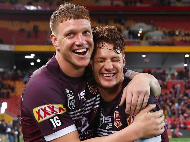 Dylan Napa (L) and Kalyn Ponga (R) of the Maroons celebrate victory at the end of game one of the 2019 State of Origin series. Picture: Cameron Spencer/Getty Images