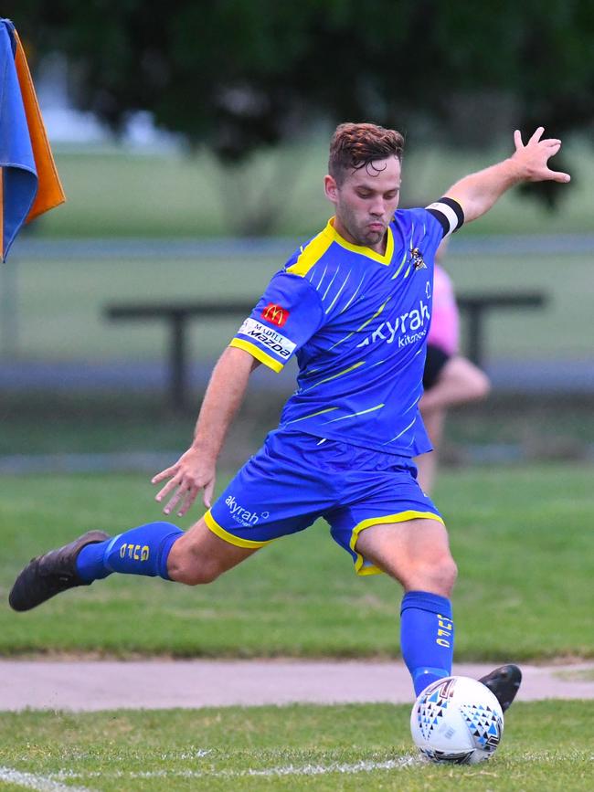 Billy Bayldon sends in a corner kick for Gympie United Gladiators. Picture: Shane Zahner