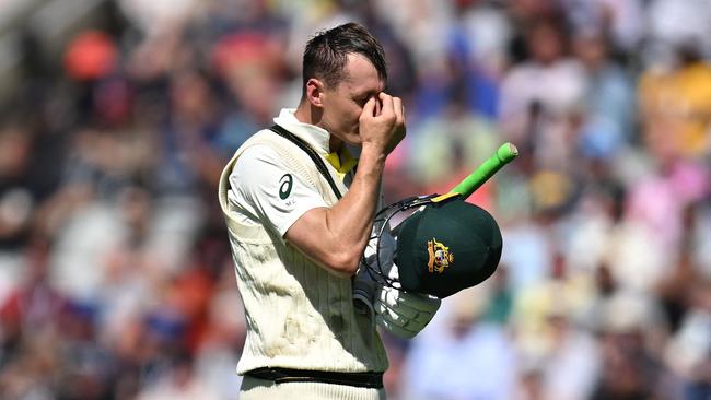 Australia's Marnus Labuschagne reacts as he walks back to the pavilion. (Photo by Oli SCARFF / AFP)