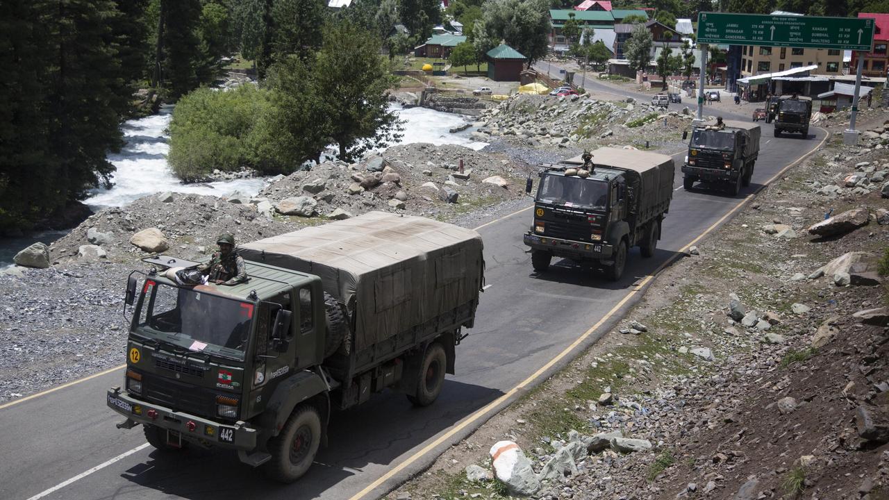 An Indian army convoy moves on the Srinagar- Ladakh highway at Gagangeer, north-east of Srinagar, India. Picture: Mukhtar Khan/AP