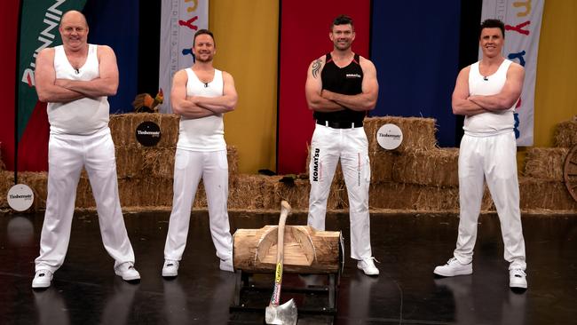 Billy Brownless, Nathan Brown, Laurence O'Toole and Matthew Lloyd take part in the wood chop. Picture: Fiona Hamilton/Channel 9