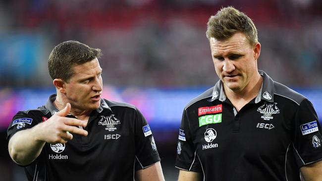 Scott Burns, left, with Nathan Buckley during his time as an assistant coach at the Magpies. Picture: Daniel Kalisz/Getty Images