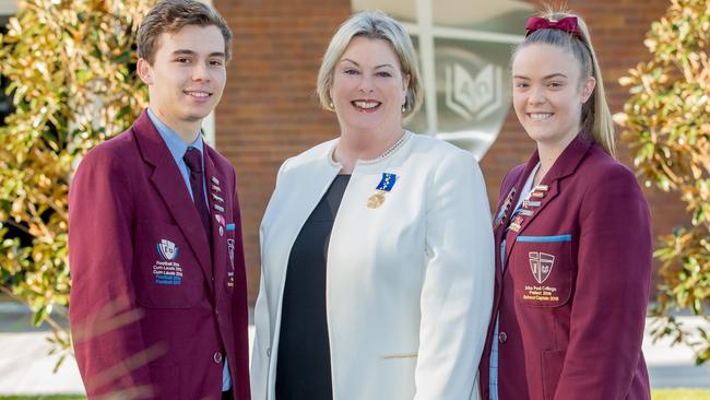 Principal of John Paul College Karen Spiller, centre, put the boost down to routine programs at the school.